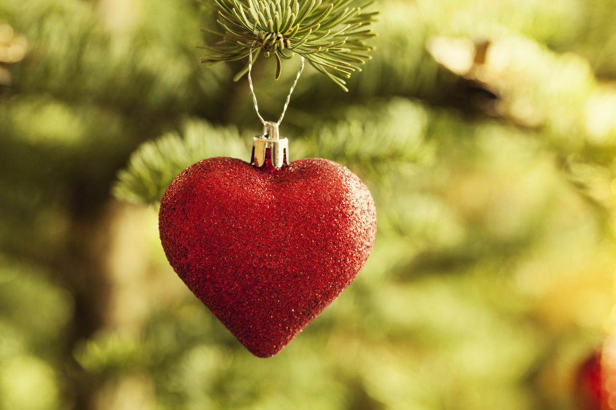 christmas red bauble heart shape in tree